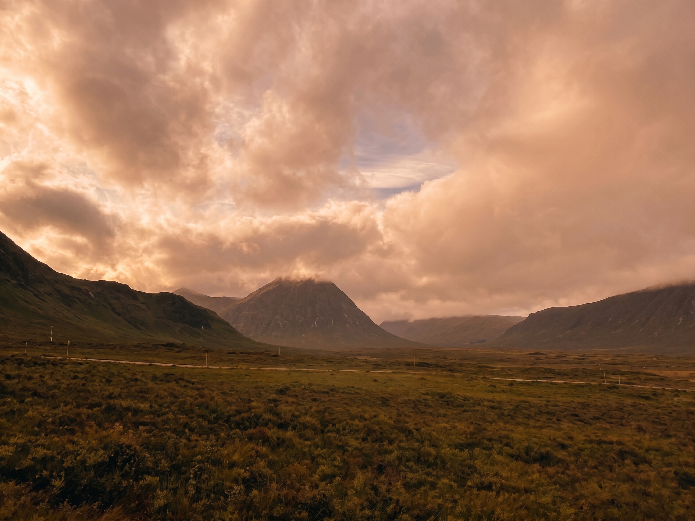 Glen Coe wilderness under evening cloud, colour-graded for Rat Race 2027