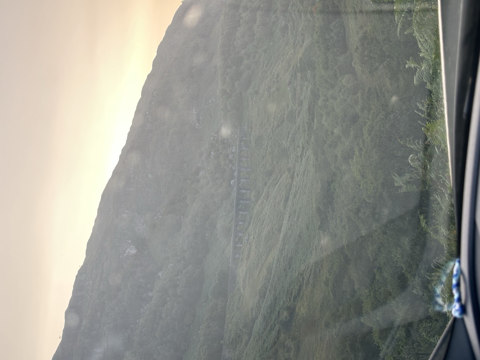 Glenfinnan railway viaduct on the hillside from the car